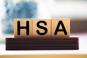 Scrabble tiles spelling out HSA