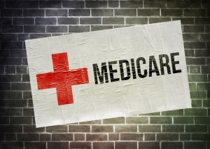 Medicare sign painted on brick wall