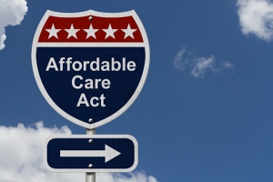 Street sign saying Affordable Care Act