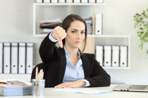 Business Woman Giving a Thumbs Down